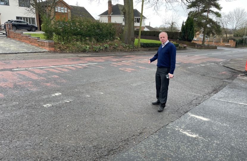 Marco inspecting the damage at the junction between Gospel End Road and the Northway