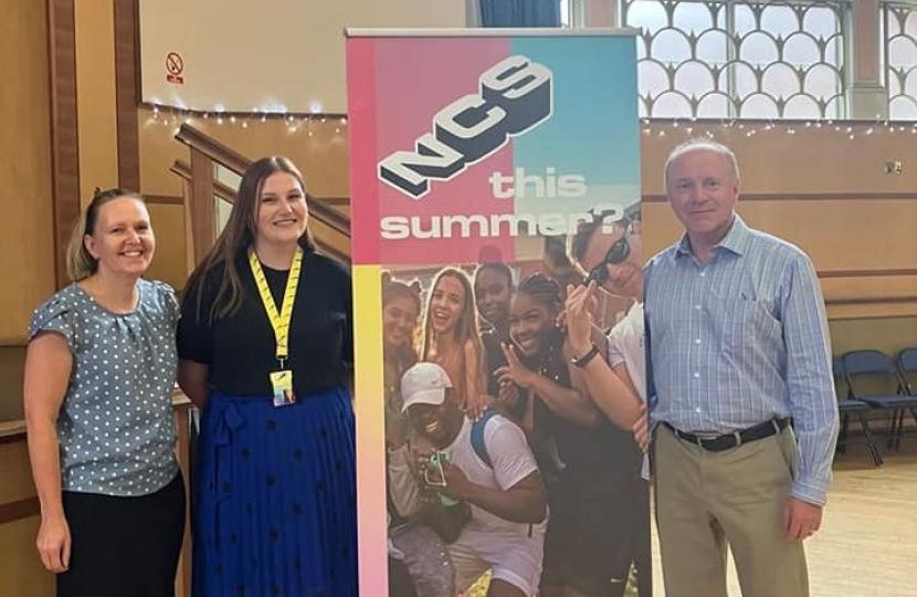 Marco Longhi MP with NCS banner