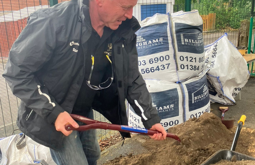 Marco Longhi MP helping to create a new planting area