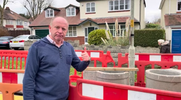 Marco Longhi MP inspecting the works to reduce flooding on Woodland Avenue