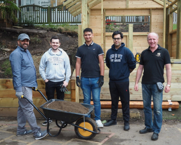 Marco Longhi MP, his team, and local community activist, Sajid Hanif